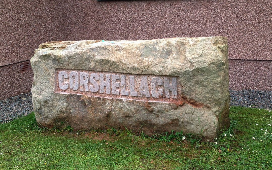Granite boulder house sign