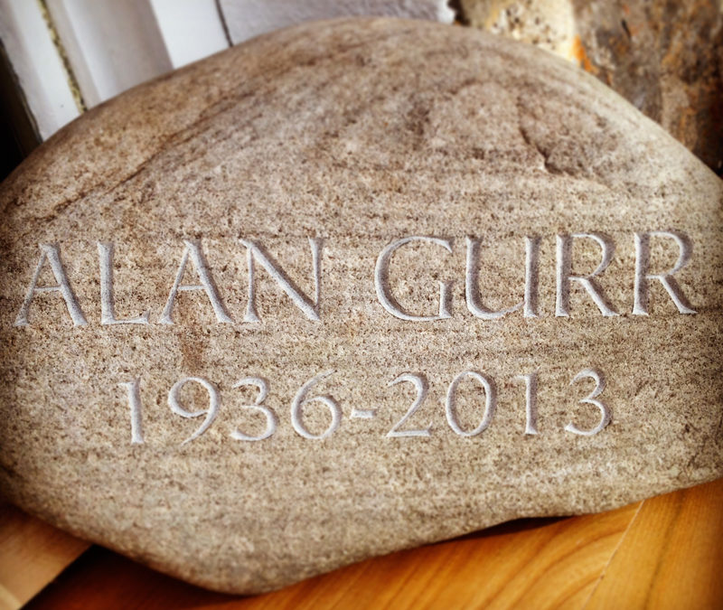 River stone grave marker