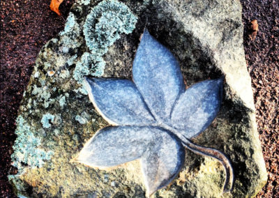 Maple leaf carved stone bird bath