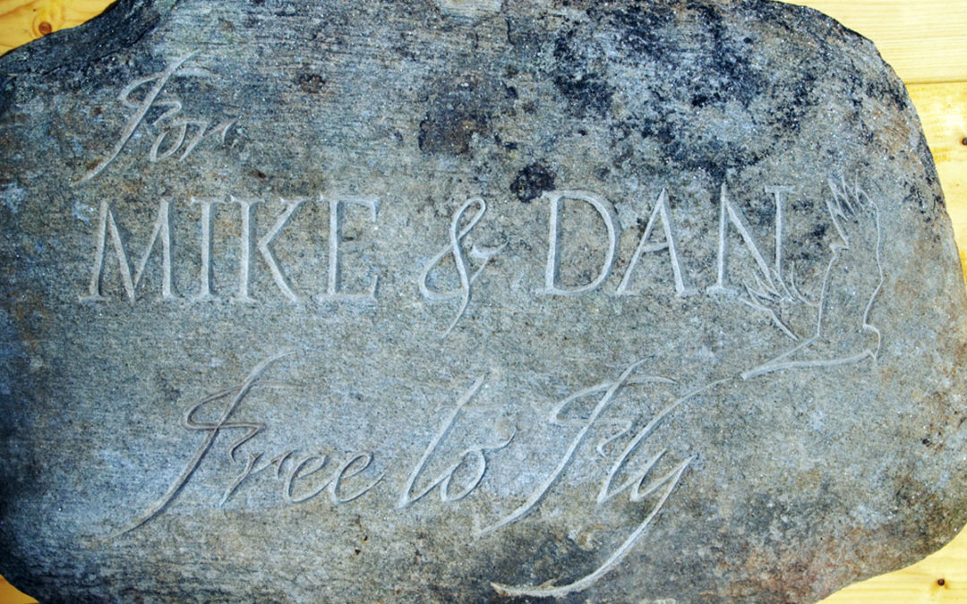 River stone grave marker